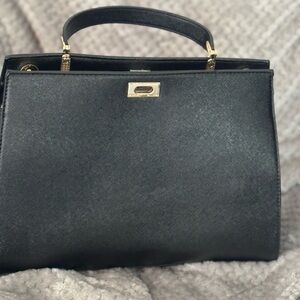 Sophisticated Black Leather Satchel with Gold Hardware